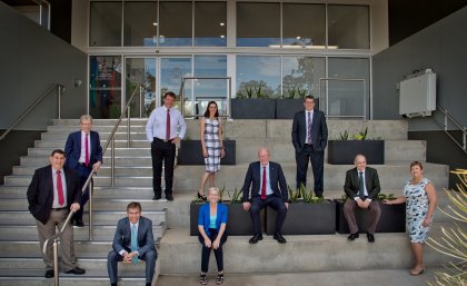 Caption (back, from left): Professor Nicholas Fisk, Mr Stephen Bennett MP, Dr Vanessa Greig, Mr Keith Pitt MP, (front, from left) Councillor Mal Forman, Professor Peter Høj, Ms Leanne Donaldson MP, Mr John Story AO, Professor Darrell Crawford Associate Professor Riitta Partanen. Full titles in body of article.