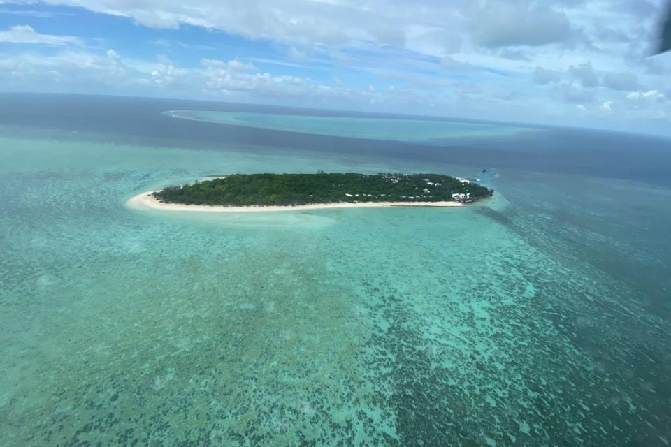 An aerial view of a small island surrounded by water.