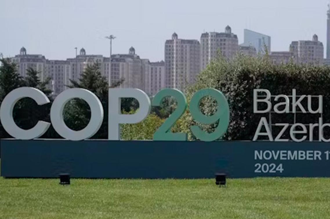 A photo of a large outdoor COP29 sign in Baku.