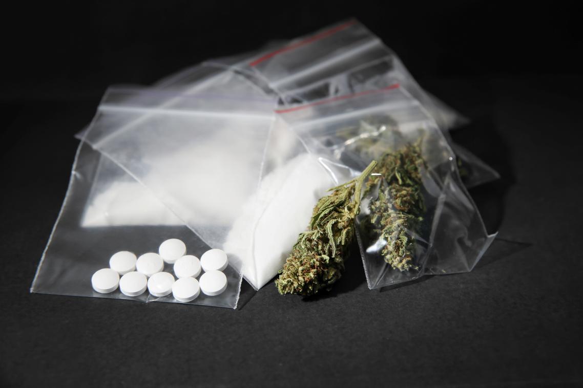 Various drugs in clear, see-through bags.