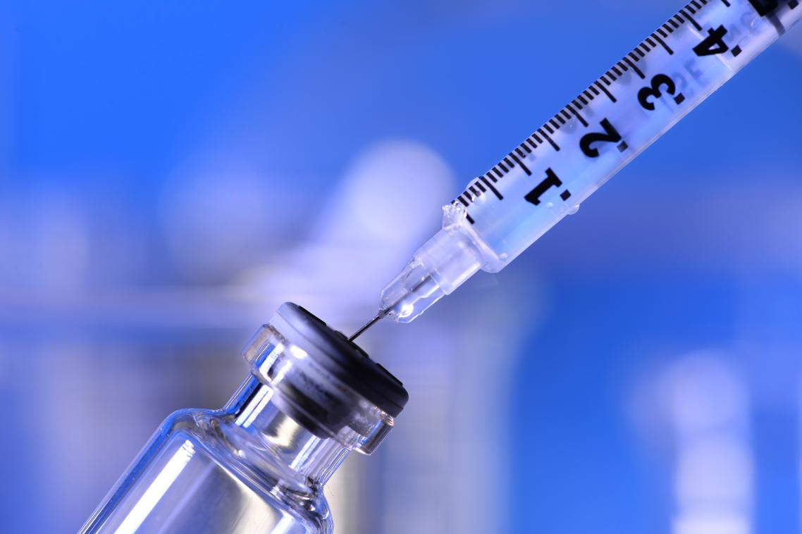 Close up of a syringe.