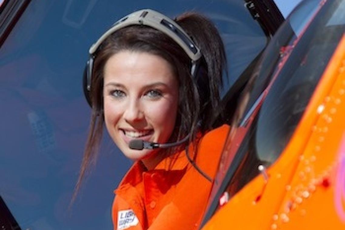 Sarah Greenhalgh looking out of a helicopter