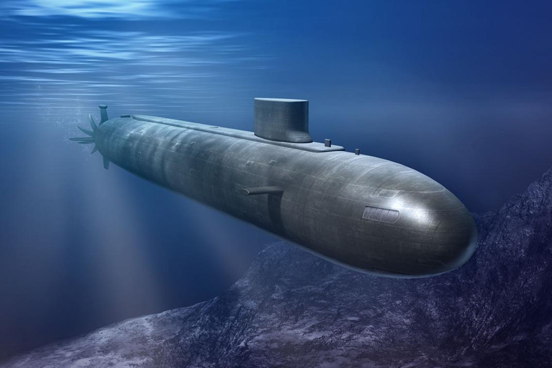 A grey submarine in the ocean.