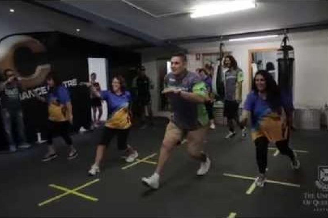 People exercising in a gym.