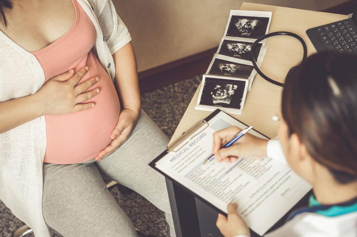 Pregnant woman getting a health check up