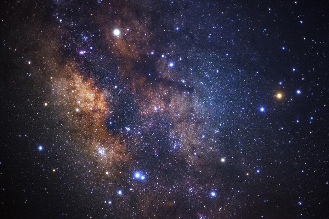 a view of the night sky with stars and planets