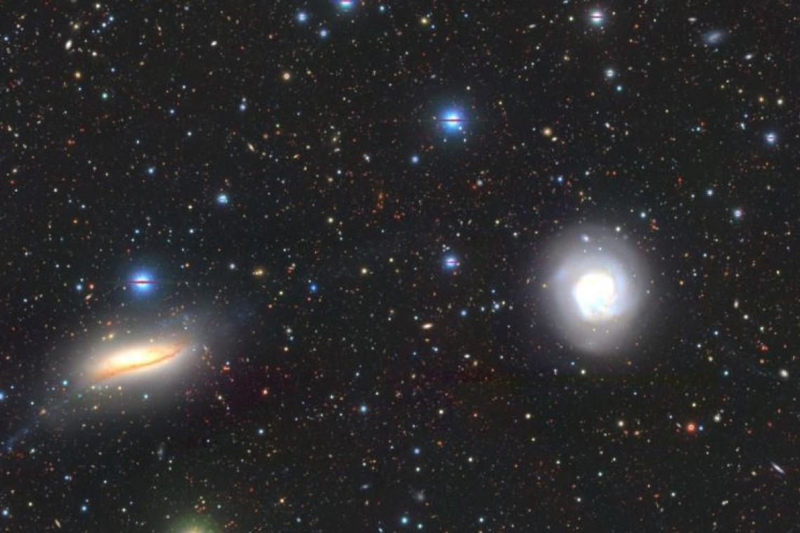 A photo of the space showing stars and galaxies