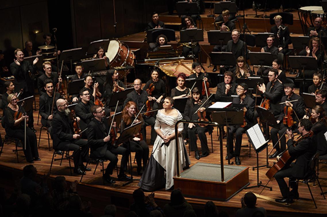 Orchestra on stage for previous performance of Eumeralla