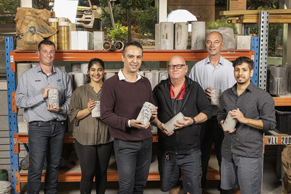 (L-R) GCP Applied Techologies' Niki Jackson, Masters student Sai Manaswi Reddy Basireddy, Dr Mehdi Serati, UQ's Shane Walker, Aurecon's Dr Harry Asche, Masters student Gautam Malgotra in the UQ laboratory