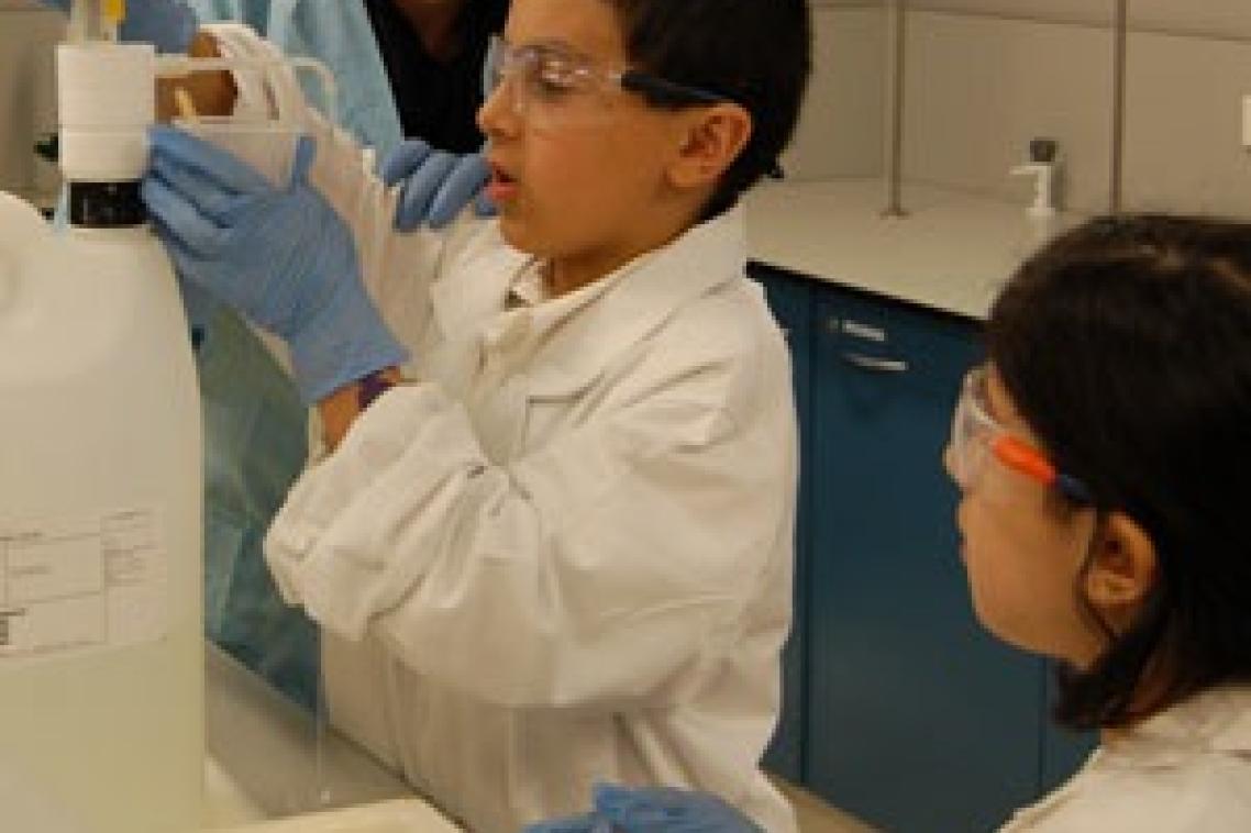Chemical concoctions: Students get a fun and practical lesson in chemistry by making slime at UQ’s Open Day.