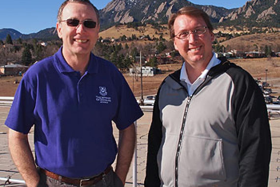 UQ PhD student Michael Hewson with Dr Steve Peckham on the rooftop of the David Skaggs Research Centre in Colorado. Image courtesy Will von Dauster