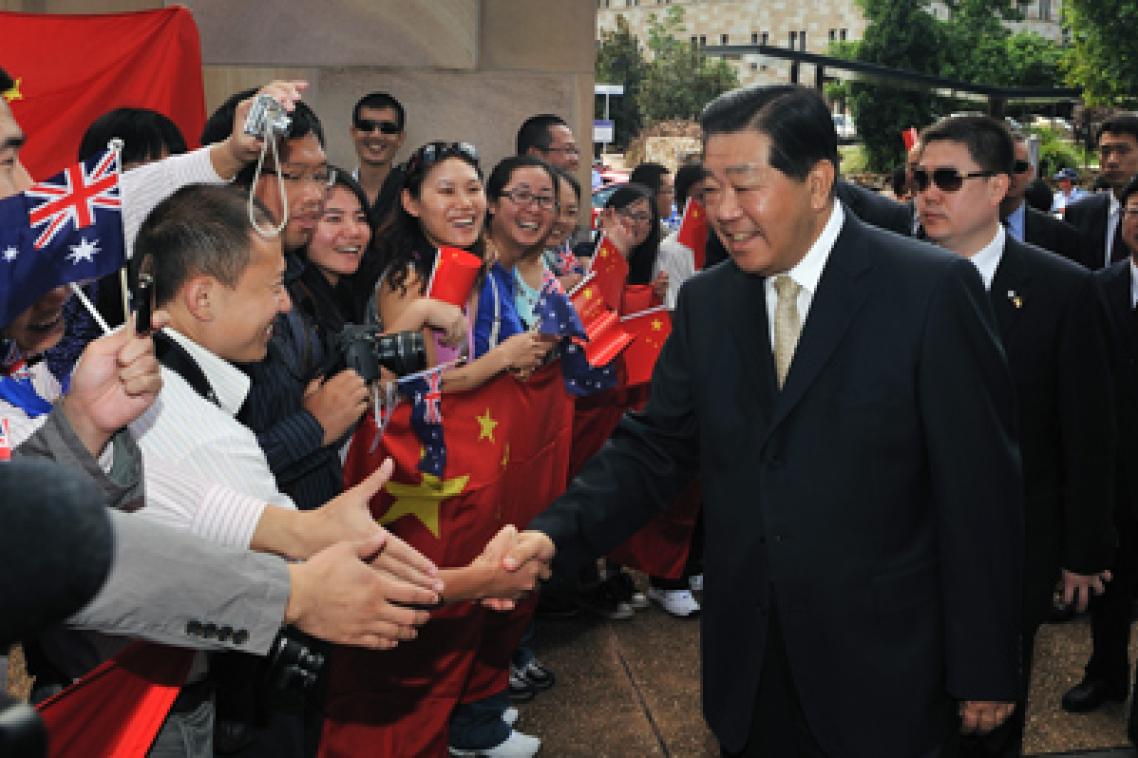 University of Queensland students meet His Excellency Mr Jia Qinglin, Chairman of the National Committee, Chinese People's Political Consultative Conference on his arrival at UQ