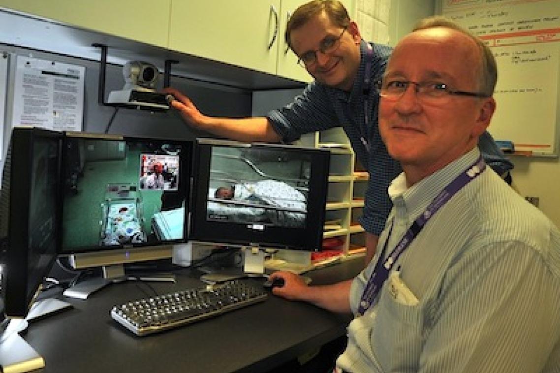 Award winning: Dr Nigel Armfield and Dr Tim Donovan have developed a telemedicine trial that enables specialists to assess sick infants in regional and country areas. Photo: Queensland Health