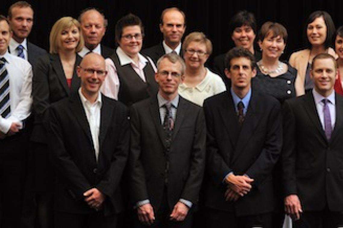 Front Row (L to R), Associate Professor Massimo Gasparon, Professor Michael Drinkwater, Dr Simon Perry, Dr Phillip Isaac. Second Row (L to R) Dr Daniel Schull, Dr April Wright, Associate Professor Lisa Nissen, Dr Patricia Short, Dr Monica Moran, Miss Jacqueline Bond. Third Row (L to R) Professor Arne Dahle, Professor Peter Dux, Mr Carl Sherwood, Dr Winnifred Louis, Ms Jane Furnas.