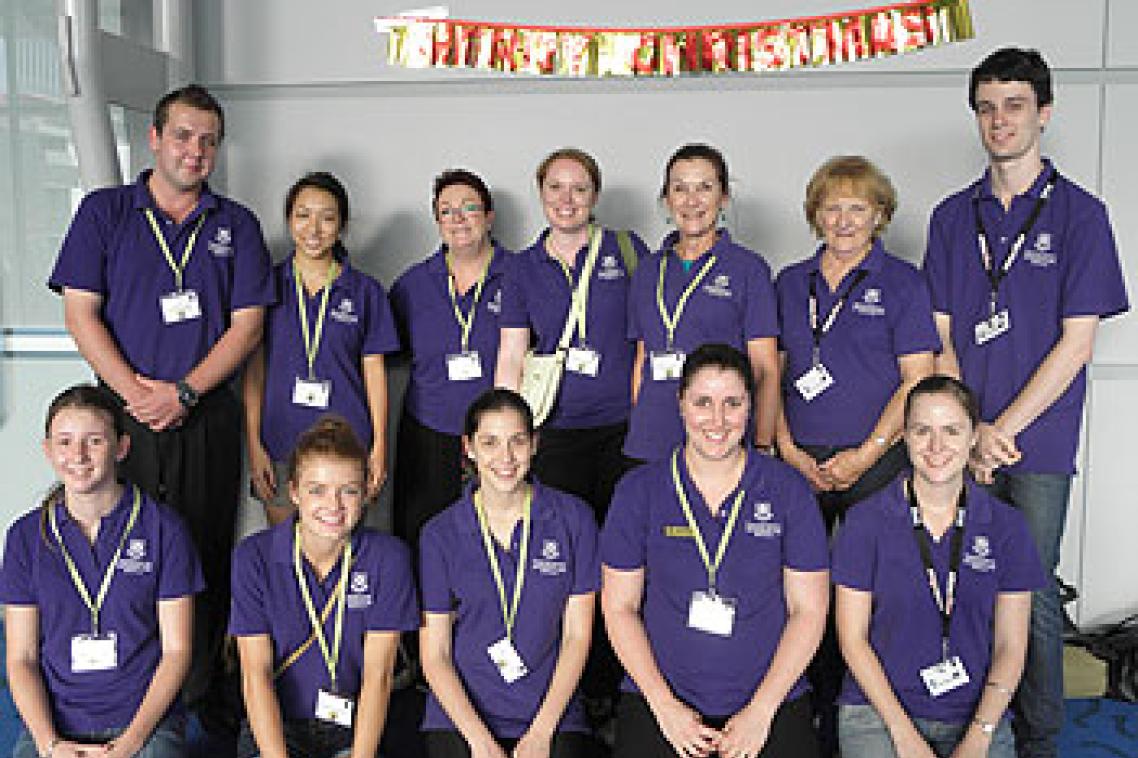 Members of "Team UQ" pitch in to assist the Smith Family Christmas Appeal