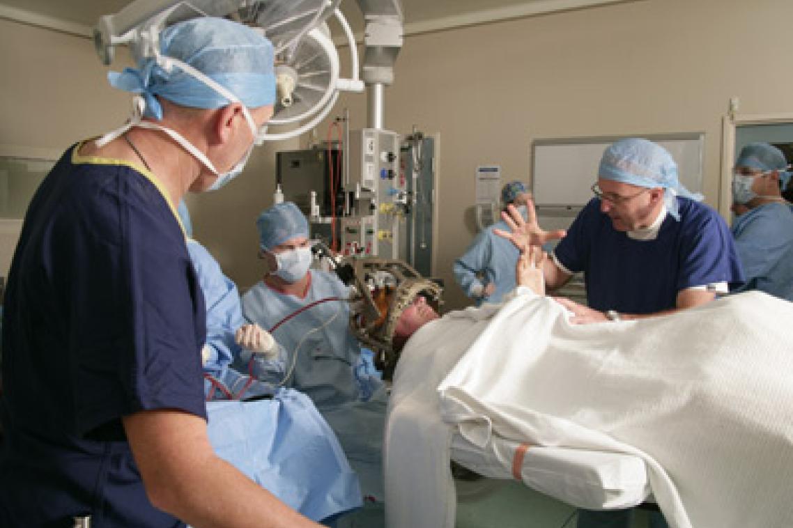 World leaders in deep brain stimulation, Professor Peter Silburn, Associate Professor Terry Coyne and his team.