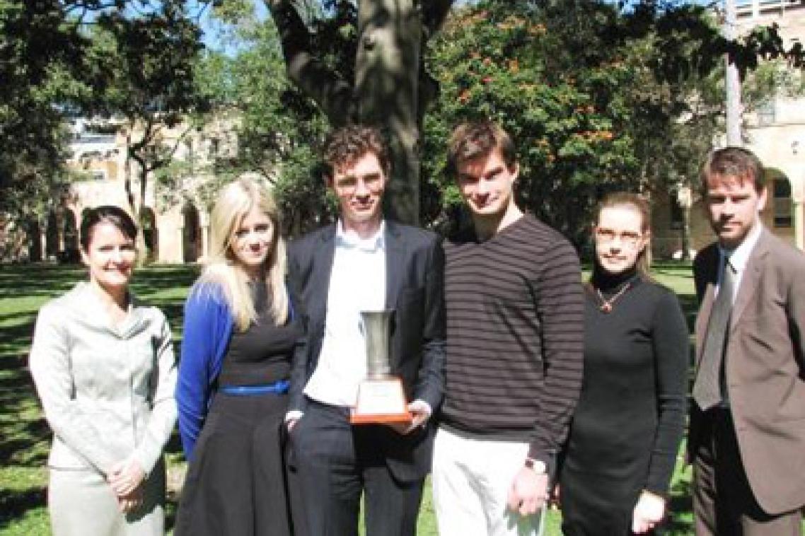 Moot competition winners (from left) Michelle Taylor from UQ team sponsor Norton Rose, Bianca Kabel, Joshua Underwood, Mitchell Beebe, Coach Dr Sarah Derrington, and UQ Law School Director of Mooting Dr Peter Billings.
