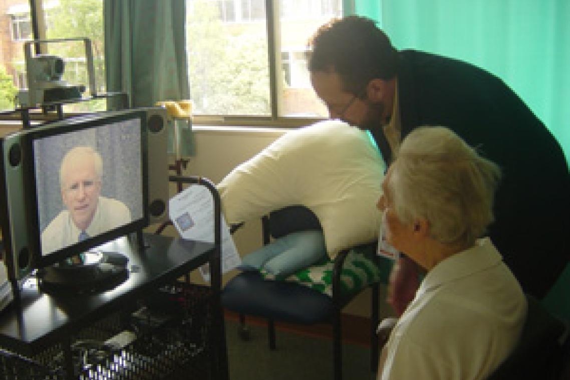 UQ’s Professor Len Gray consults with a patient using telehealth.