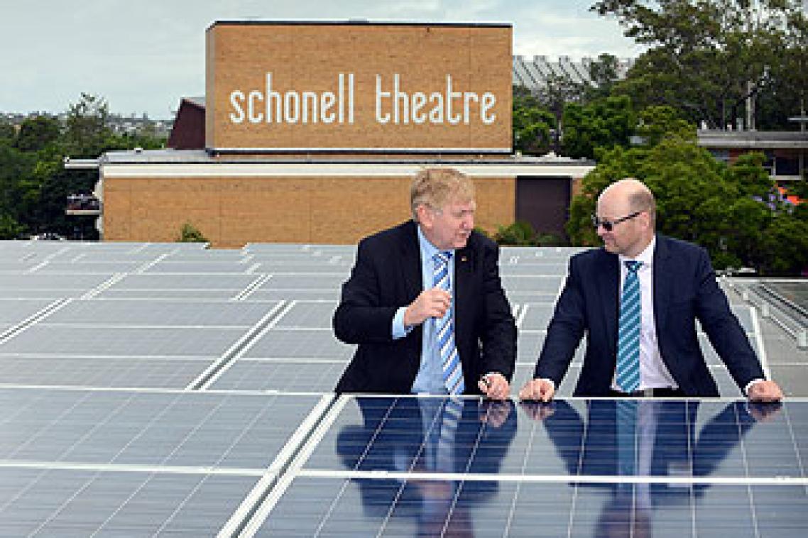 The federal Minister for Resources and Energy, Martin Ferguson, and Professor Paul Meredith at UQ's rooftop solar photovoltaic array