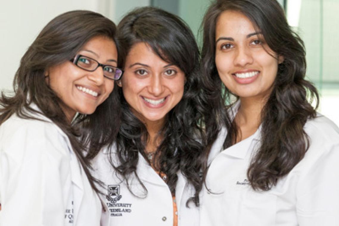 UQ first year pharmacy students Ms Ila Patel (accelerated student); Ms Natasha Kissoon and Ms Mandeep Kaur Rao (accelerated students) received their white coats at a recent welcoming ceremony.