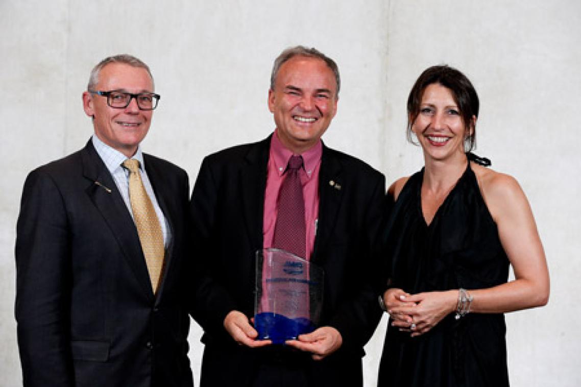 Professor Jurg Keller receiving the Water Professional of the Year award from Australian Water Association CEO, Tom Mollenkopf (Left) and President, Lucia Cade (Right)