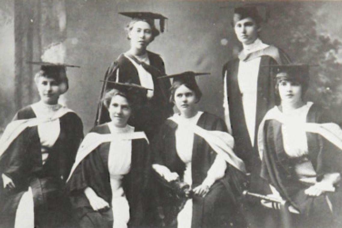 UQ graduates who completed their studies in 1913, pictured at their graduation ceremony the following year. Image courtesy of Fryer Library.