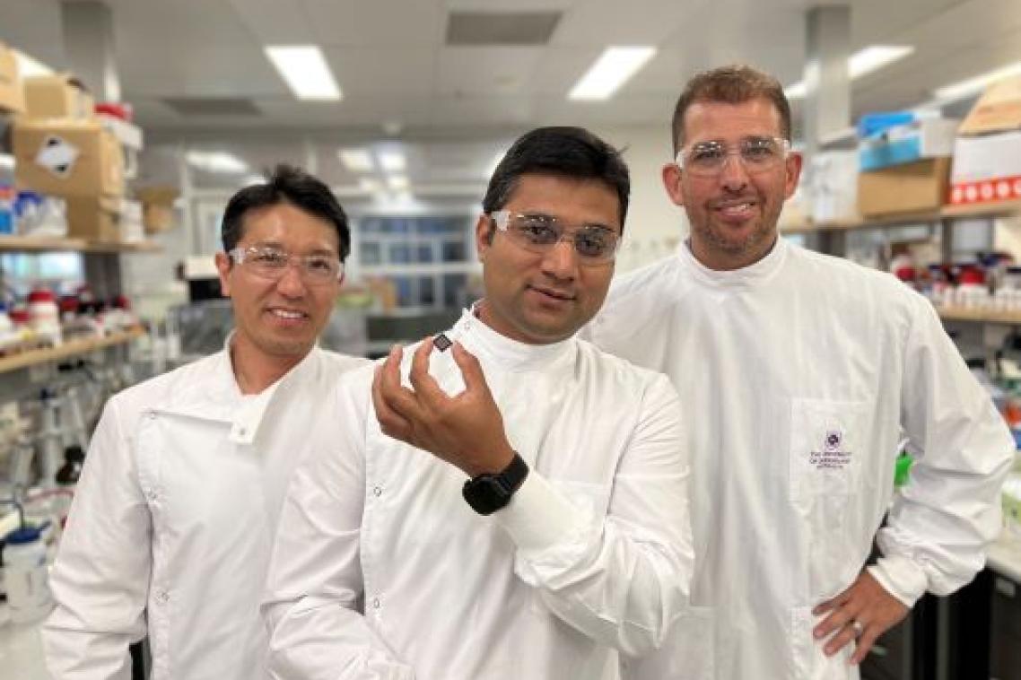 UQ researchers with a component of a newly developed rapid sensor.