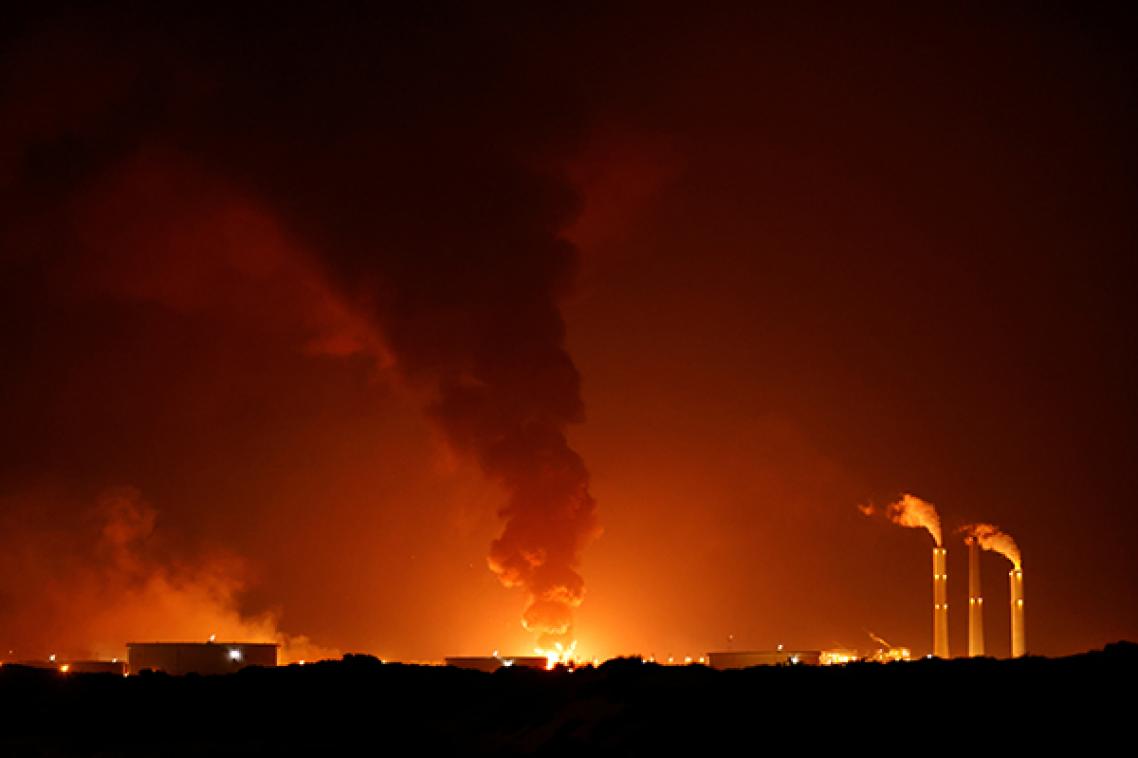 A large fire is seen near the scene of what officials said was a Gaza rocket attack on an Israeli energy pipeline near Ashkelon, Israel, May 11, 2021. REUTERS/Amir Cohen