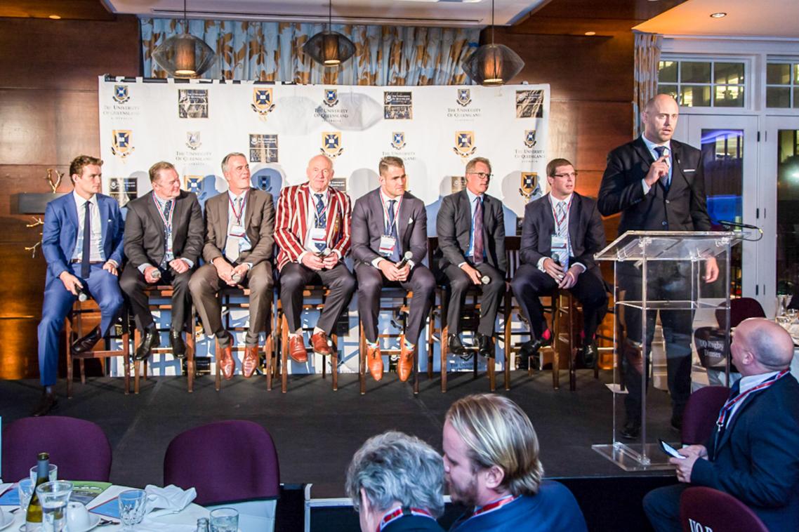 The panel addresses the audience.