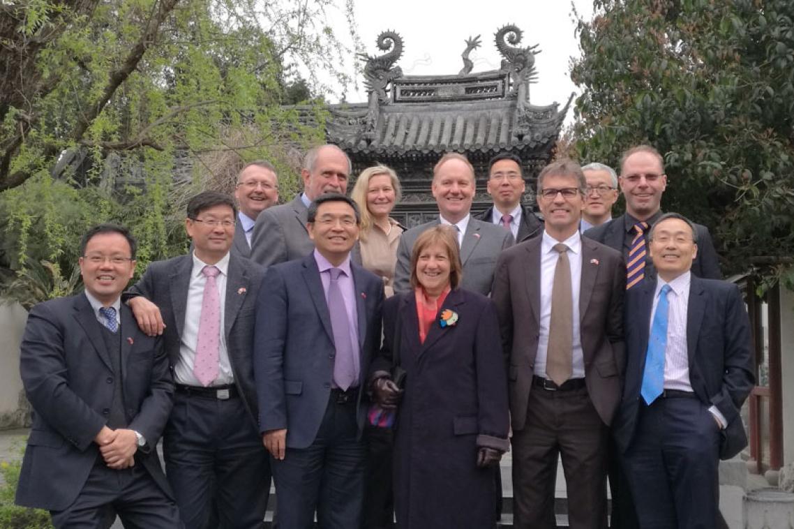 The group of executives after the signing, in Shanghai's Yuyuan Garden. 