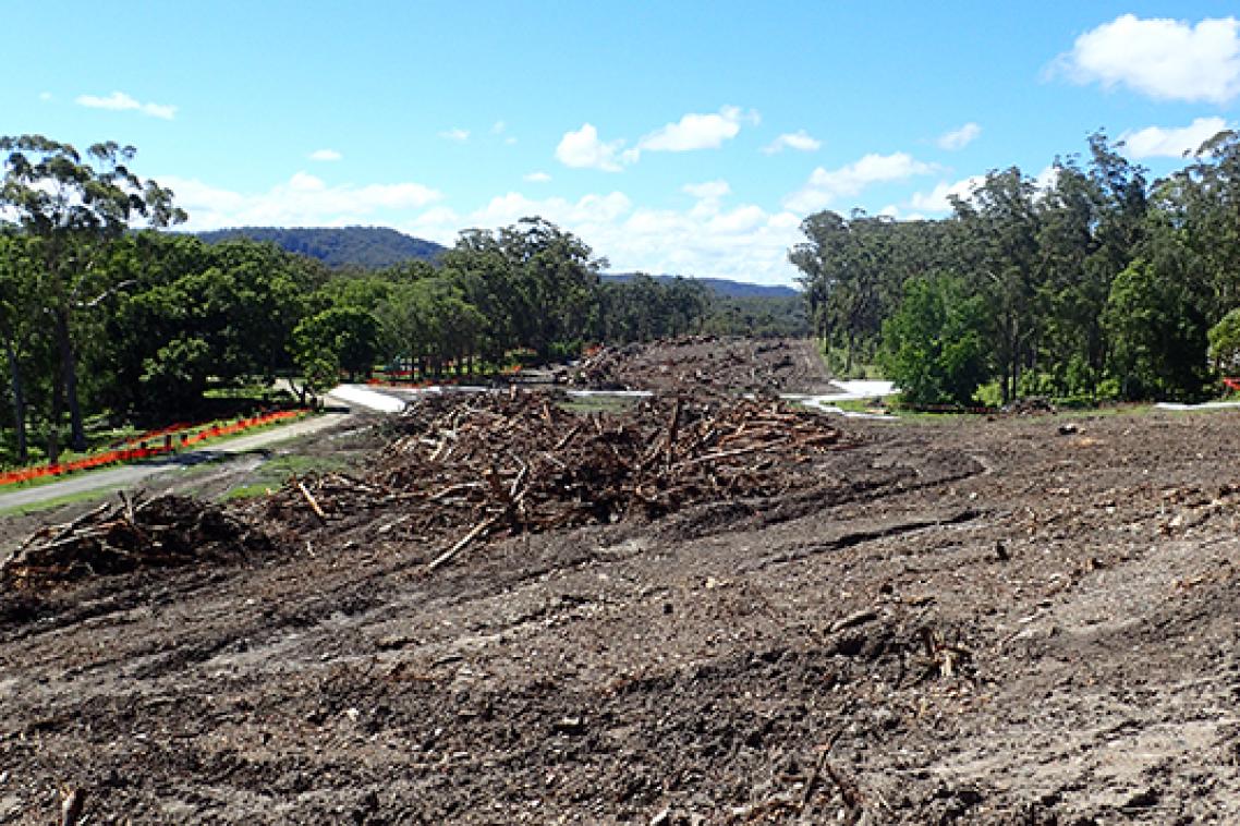 Soil revealed after vegetation is cleared on a block of land