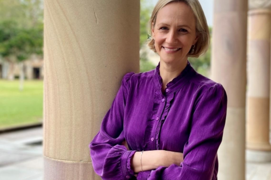 Dr Miriam Moeller standing in the Great Court at UQ St Lucia.