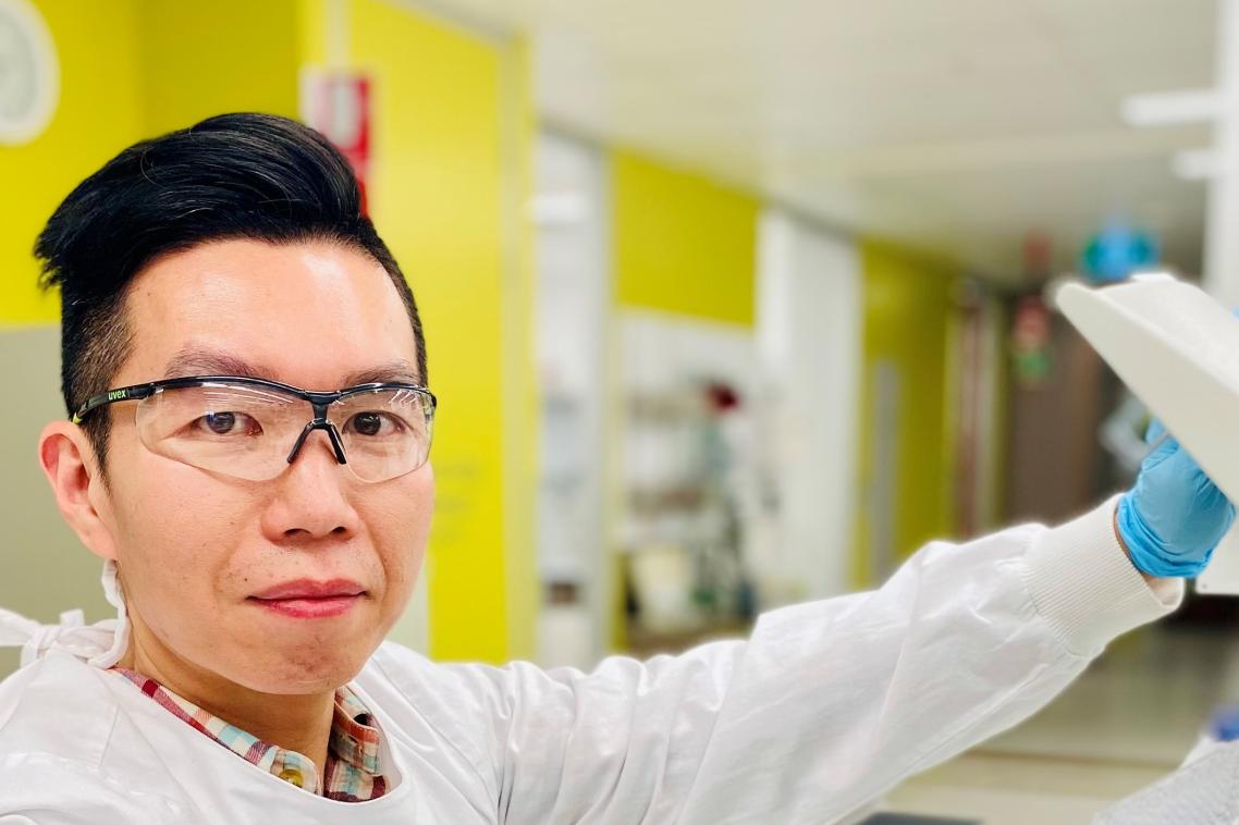 Closeup of Professor Di Yu in a laboratory setting