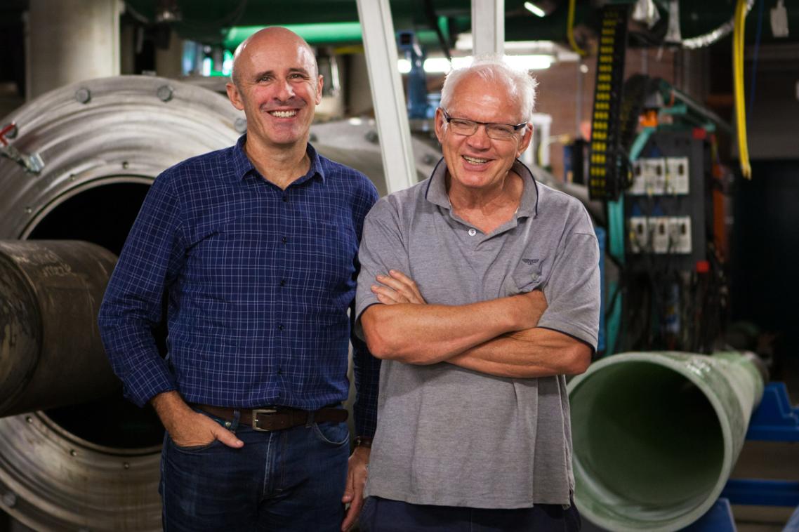 Professor Richard Morgan (right) at the UQ Centre of Hypersonics ground-testing facility, with colleague Professor Michael Smart.