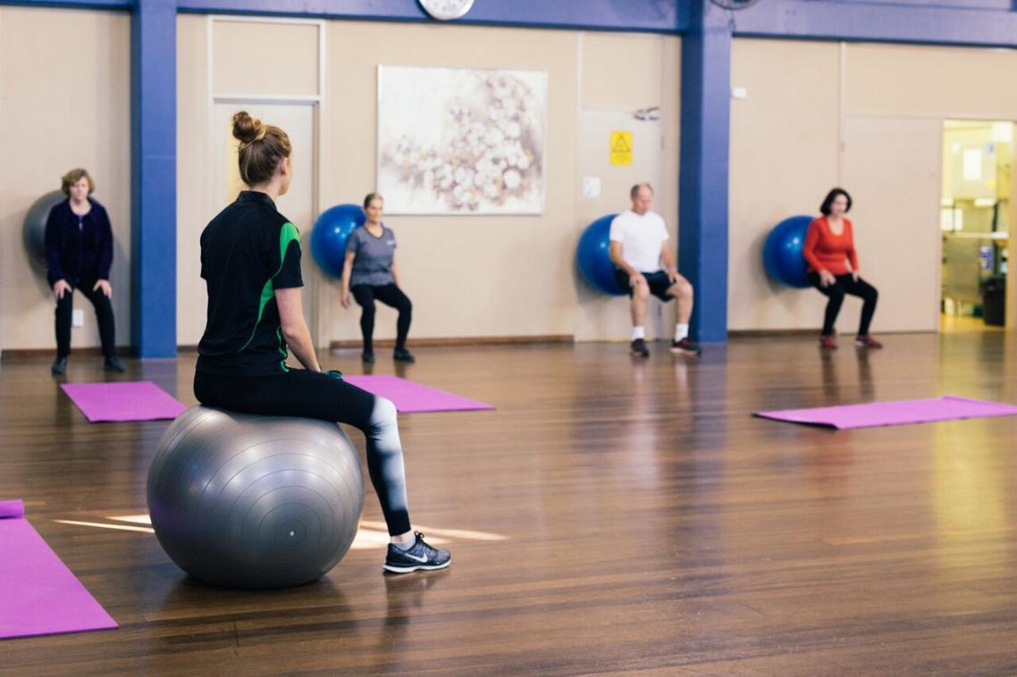 Renee Weller runs a fitball class.