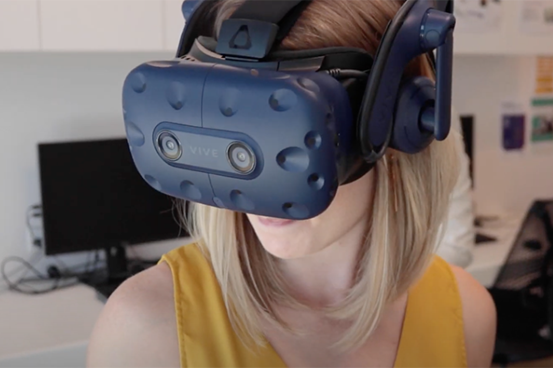 Woman wearing VNR contraption over her eyes