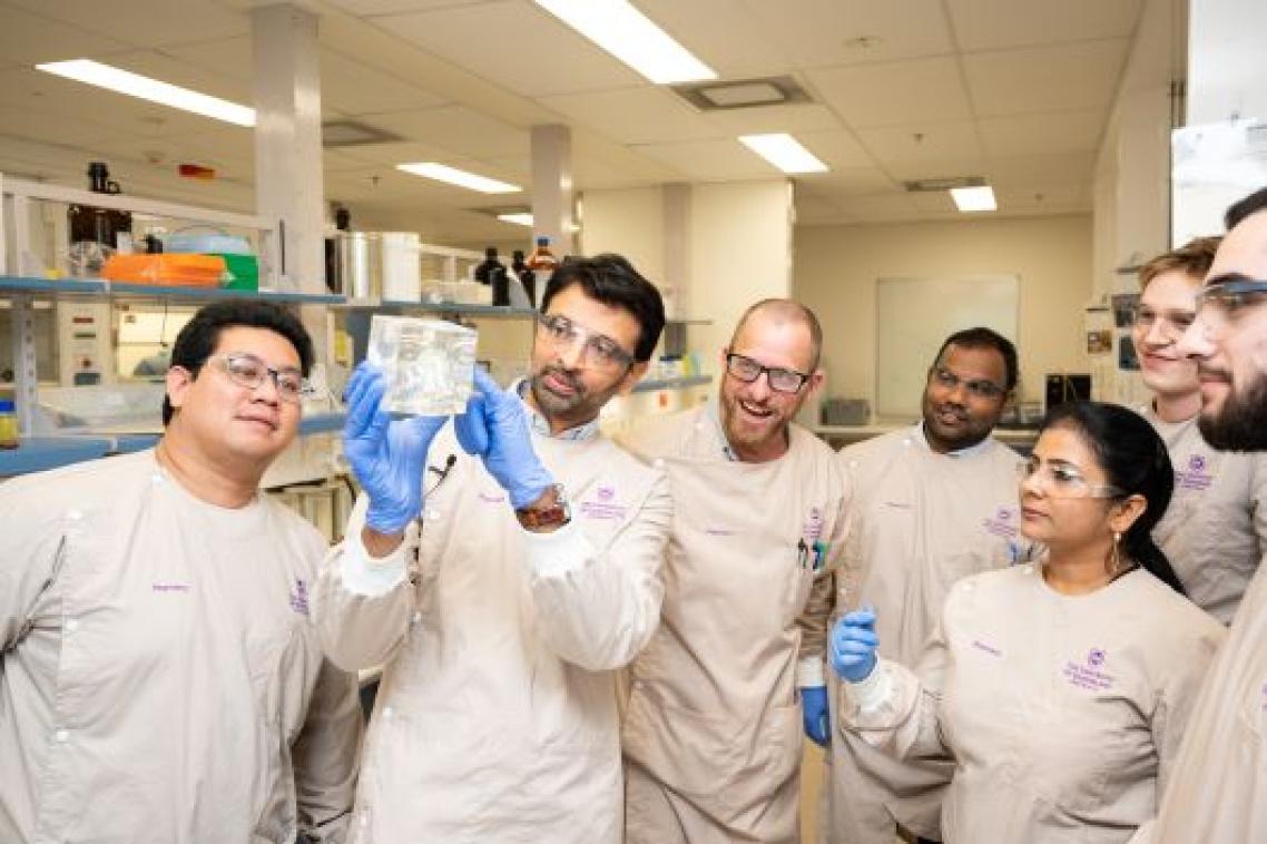 Dr Harendra Parekh (second from L) and research team looking at module