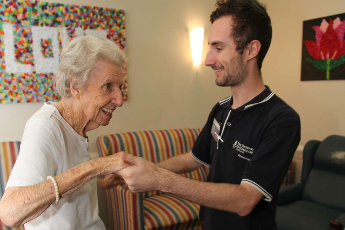 Daniel Innes with a resident ... "every morning the stereo went on and I was on my feet, being led around the make-shift dancefloor"
