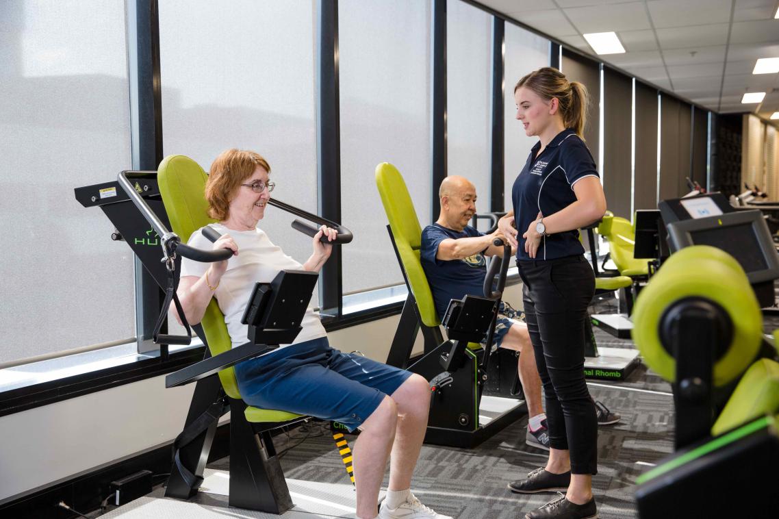 UQ Master of Clinical Exercise Physiology student practitioner Kristin Murray works with Emeritus Professor Tian Po Oei and his wife Elizabeth at UQ Healthy Living.