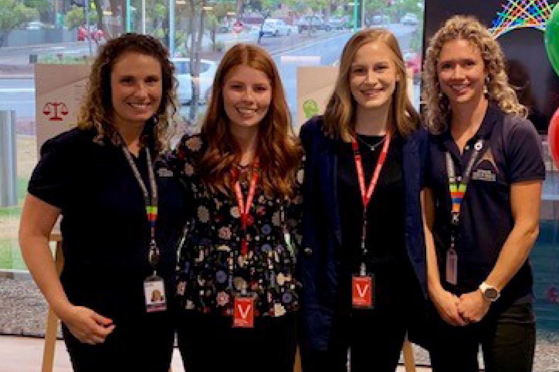 Rebecca Gavin and Bec Dunne and flanked by ACCCE staff.