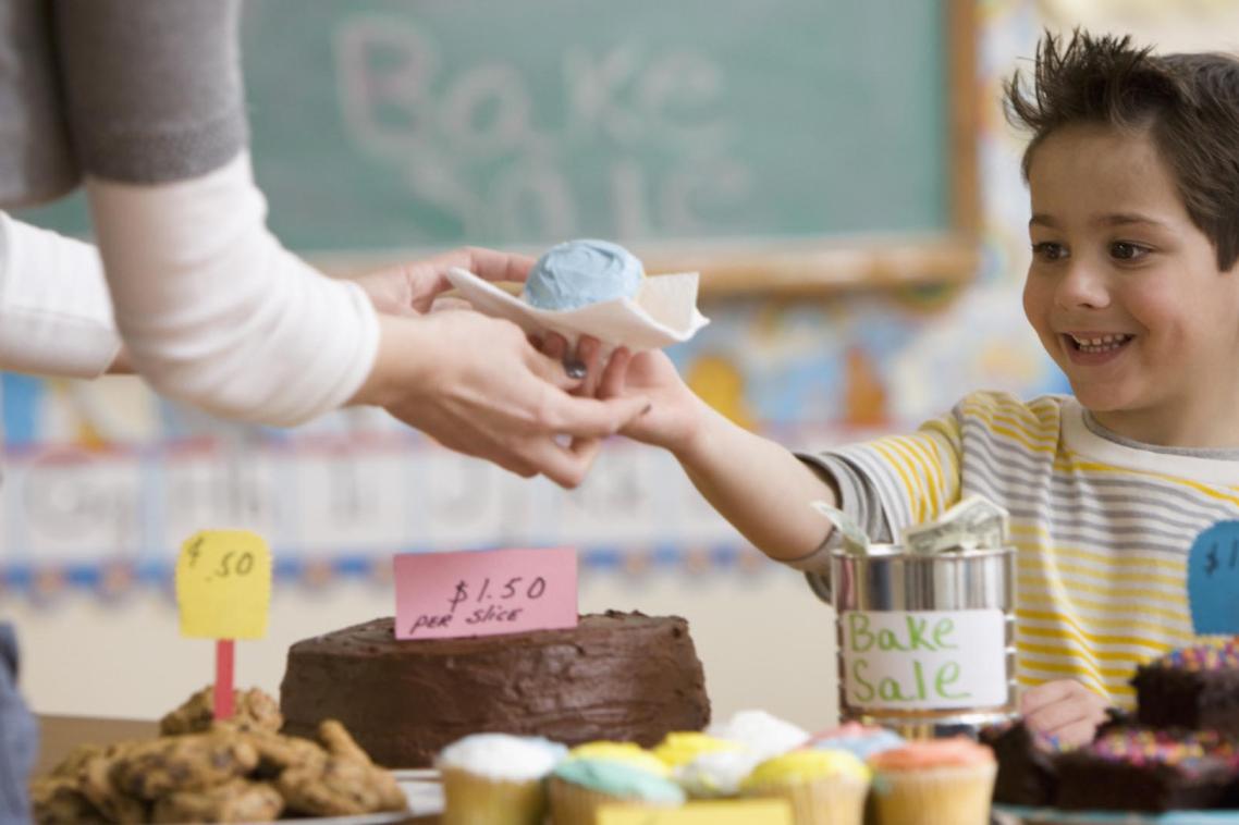 Some public schools raise up to $1 million a year – and not just via cake stalls. Getty image.