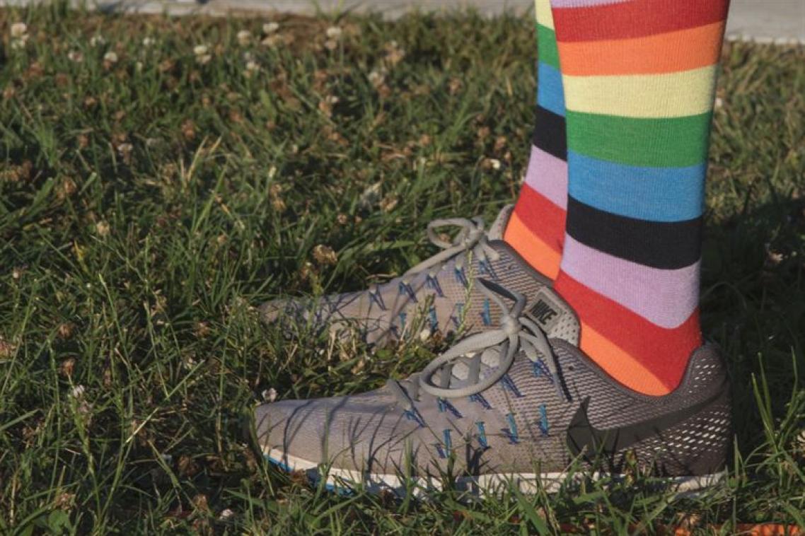 Rainbow socks in running shoes