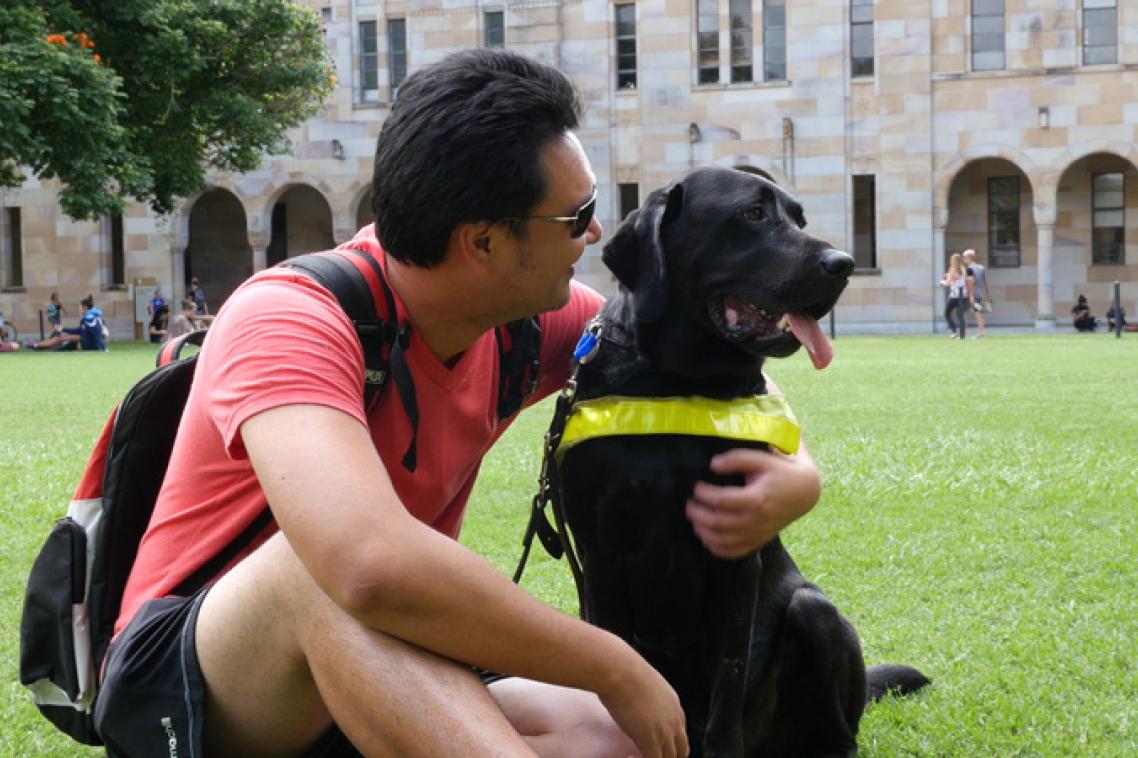 Jefferson Mac and his guide dog Ice