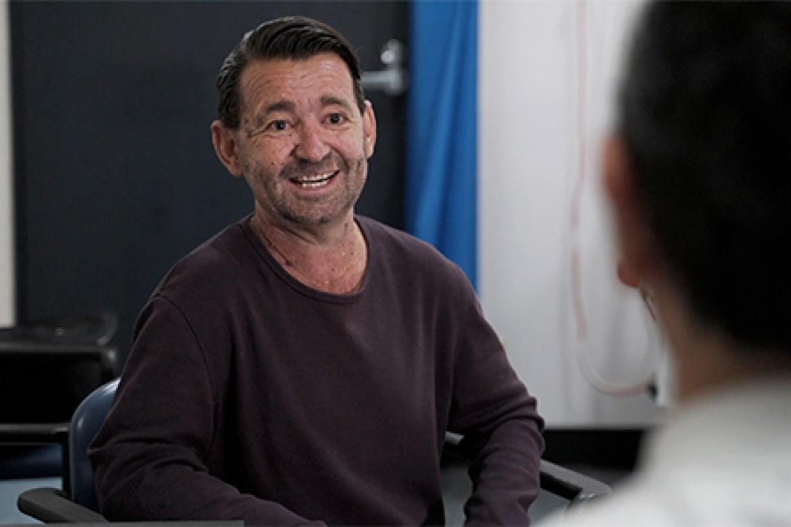 Kidney transplant recipient Matty in doctor's room.