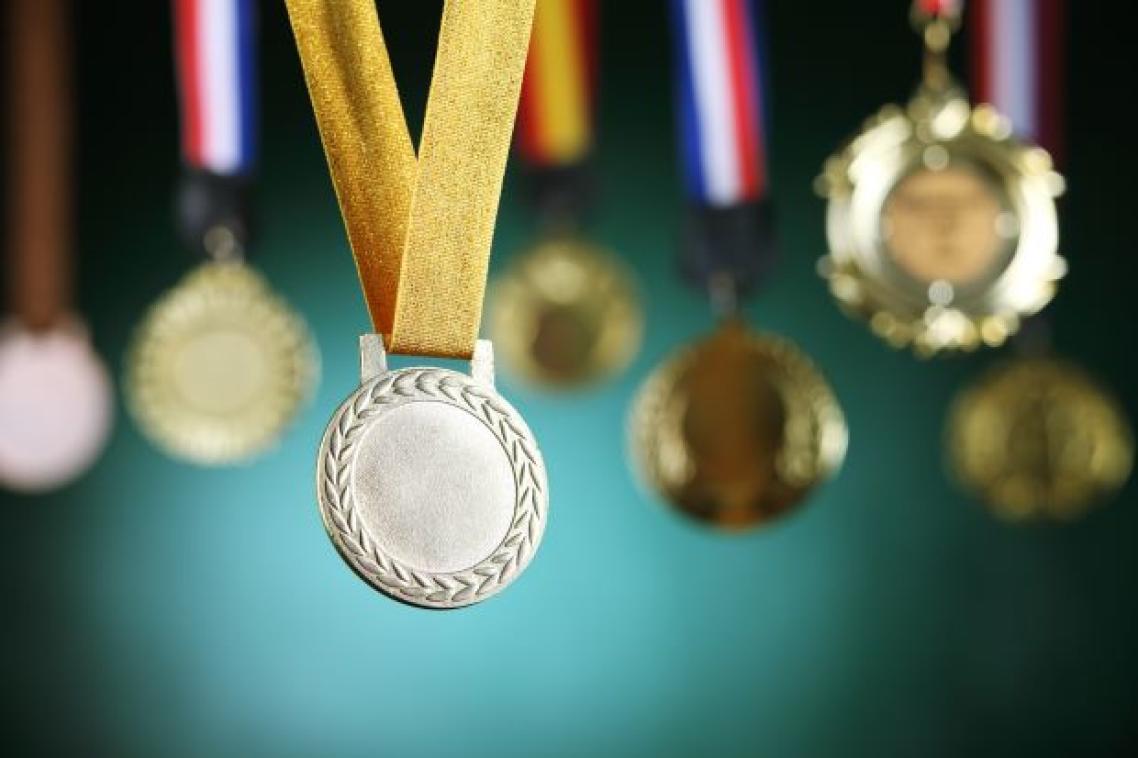 A silver, bronze and gold medal