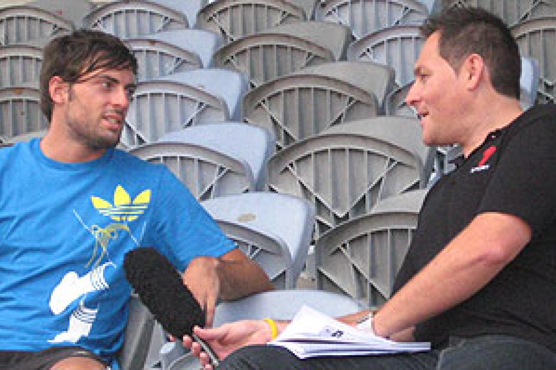 Mitchell Watt is interviewed by Channel 7 at the UQ Athletics Centre