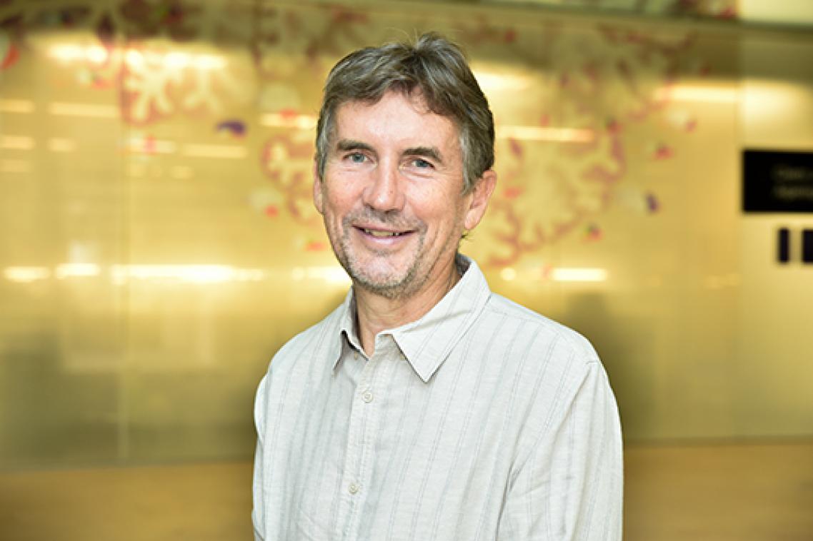 A man in a white business shirt