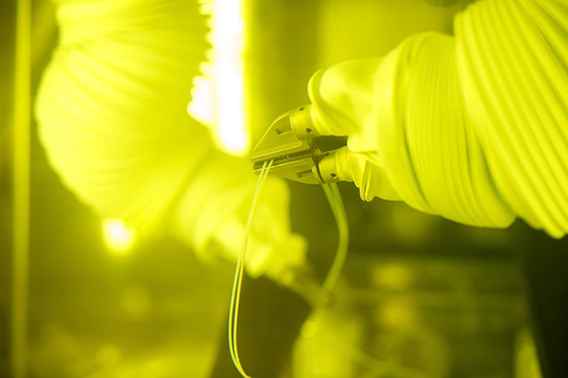 Robotic hands in radiochemistry facility
