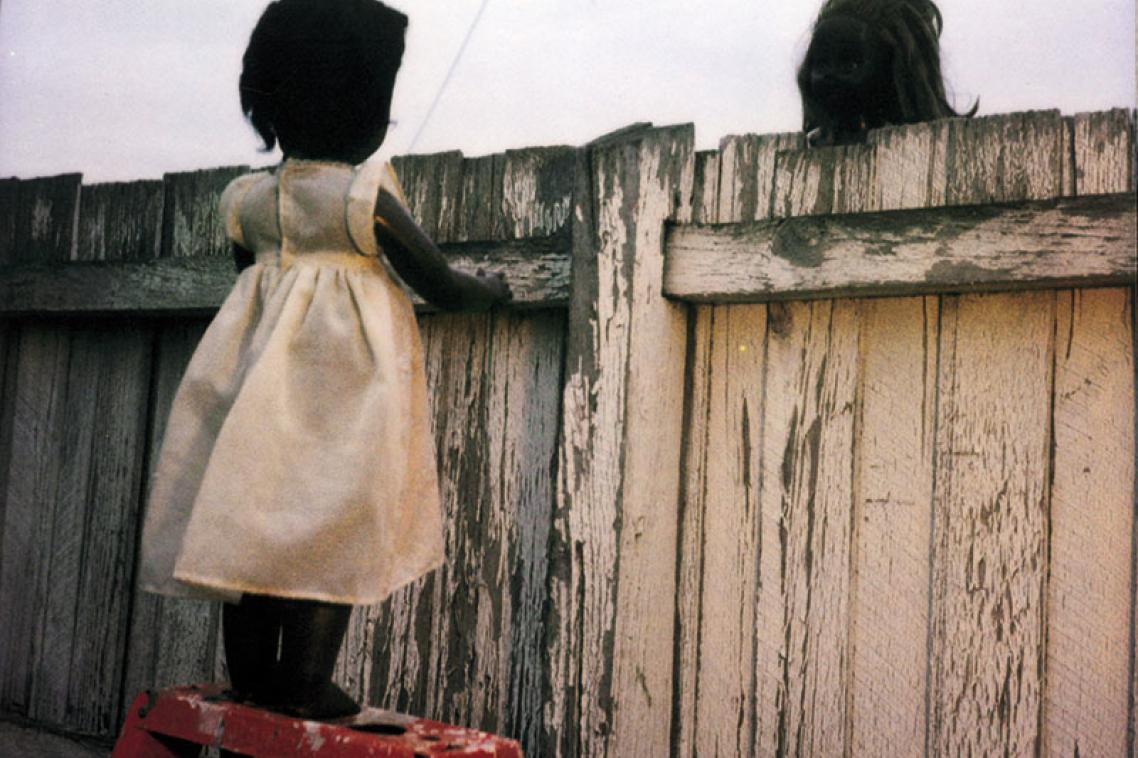 Destiny Deacon 'Over the Fence' 2000 (from the series Sad & Bad) Corrigan Collection. Reproduced courtesy of the artist and Roslyn Oxley9 Gallery, Sydney