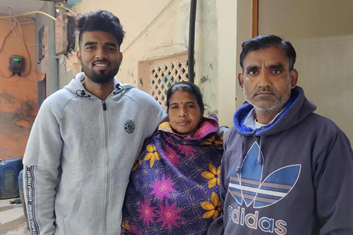 Amritesh Kumar Maurya with his parents